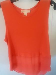 Michael Koors Orange, daintly detailed at bottom.